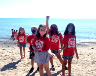 Kids on a beach at Racine Zoo summer camp small